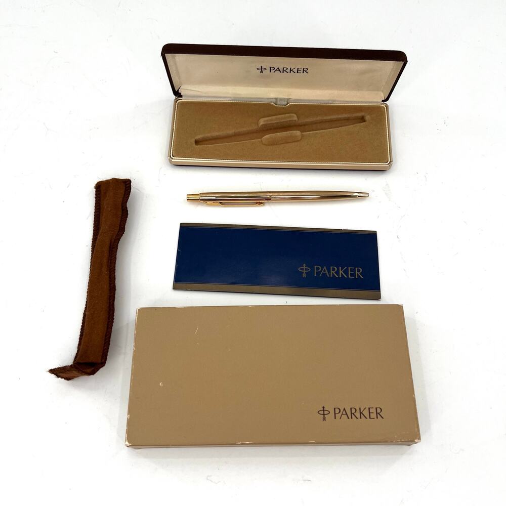 Vintage Parker gold plated pen with case. Designer
